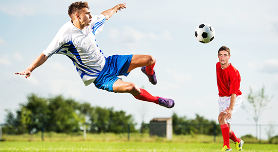 Soccer player taking a shot with the ball in the air – an example of ball trajectory analysis using a high-speed camera
