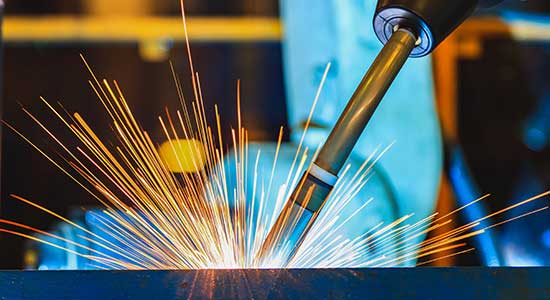 Welding process involving spatter during automated weld inspection in industrial manufacturing