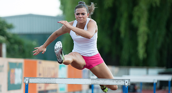 Athlete performing a hurdle jump – motion analysis in slow motion using a high-speed camera